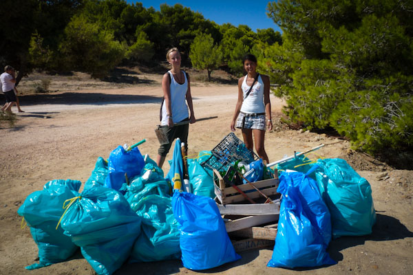 volunteer in zante zakynthos Greece with sea turtles on the beach conservation